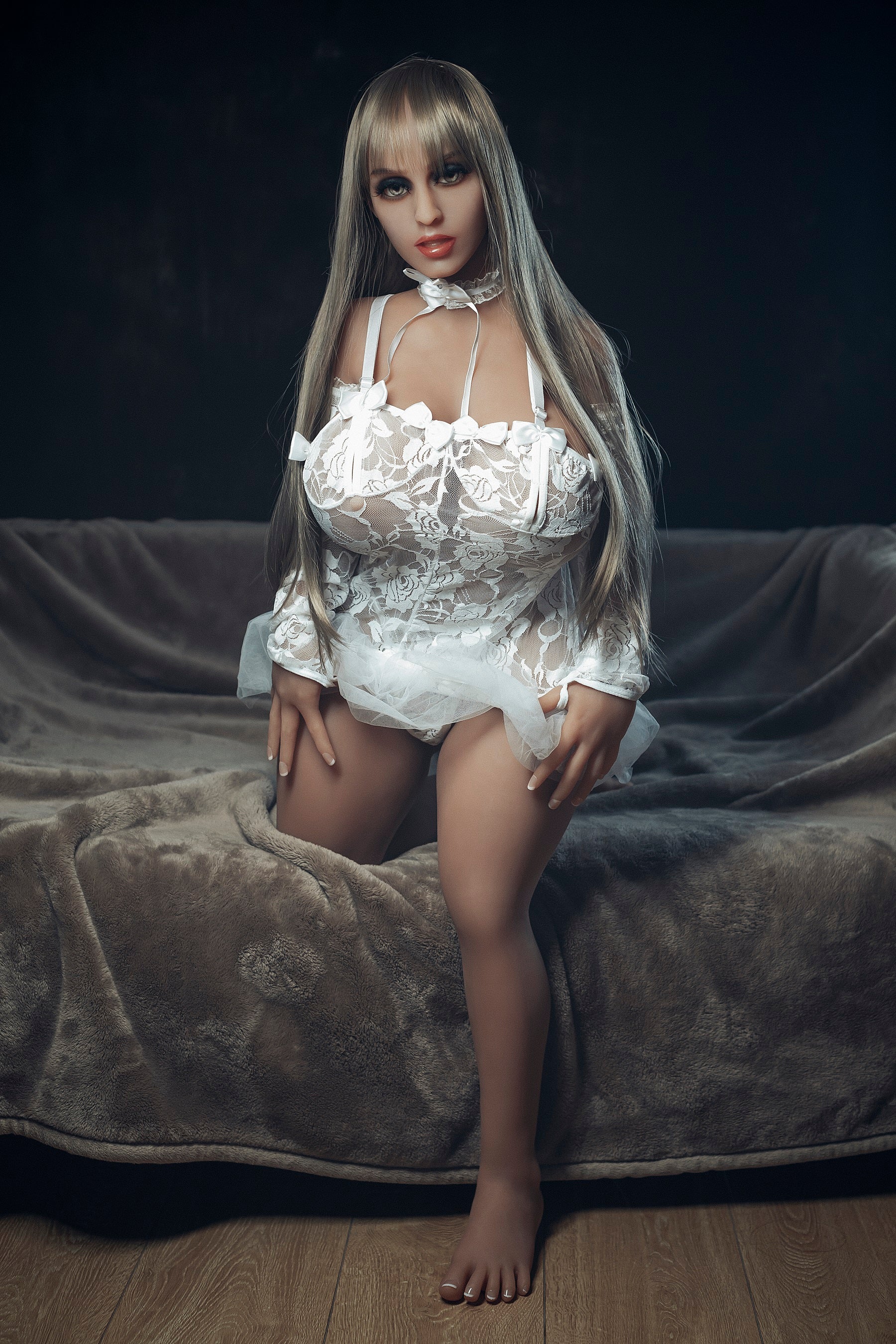 A doll with a slim body, perky hips, and plump breasts and buttocks, as well as a face-thinning realistic doll